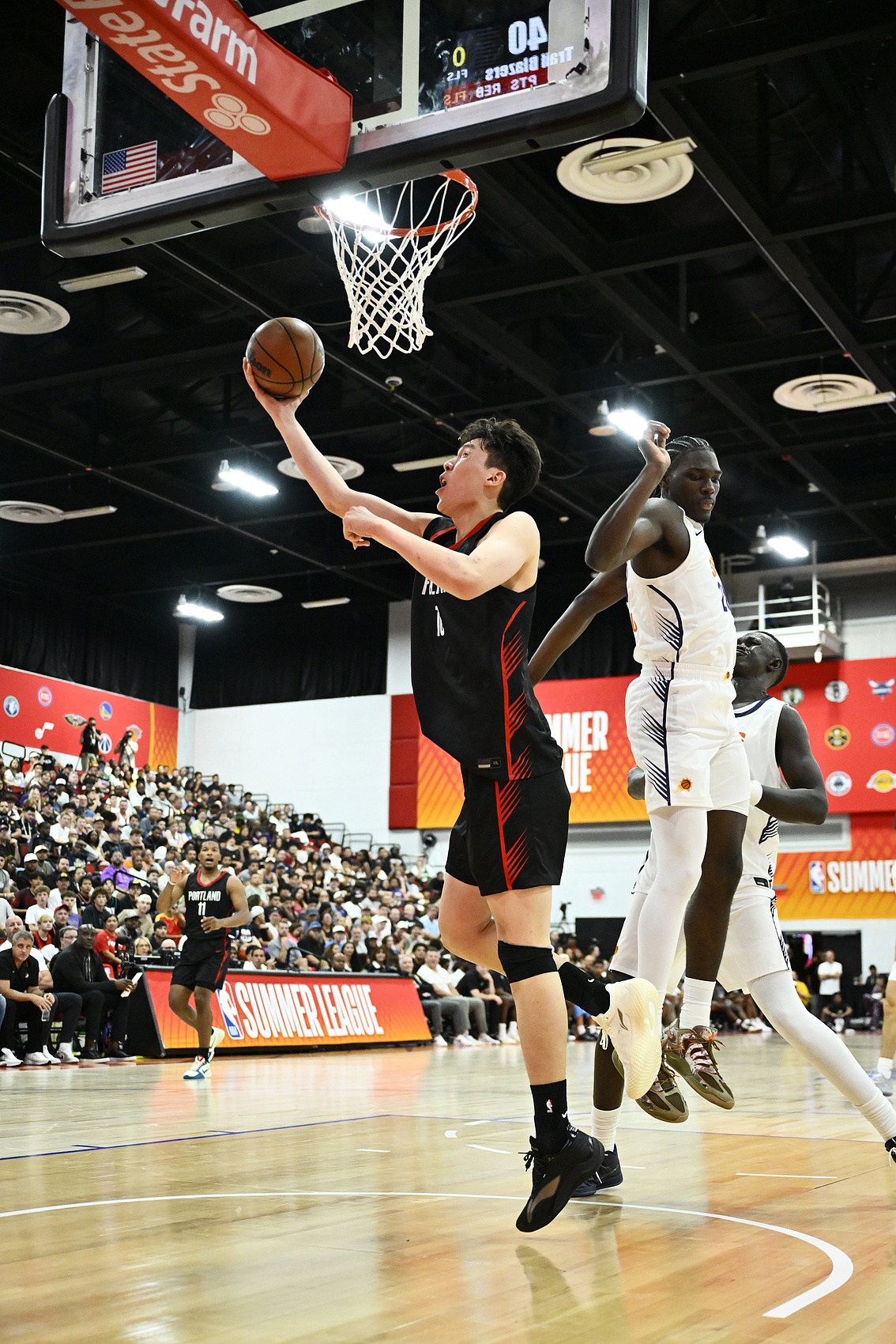 杨瀚森夏联首秀12+9+4 高位策应成亮点